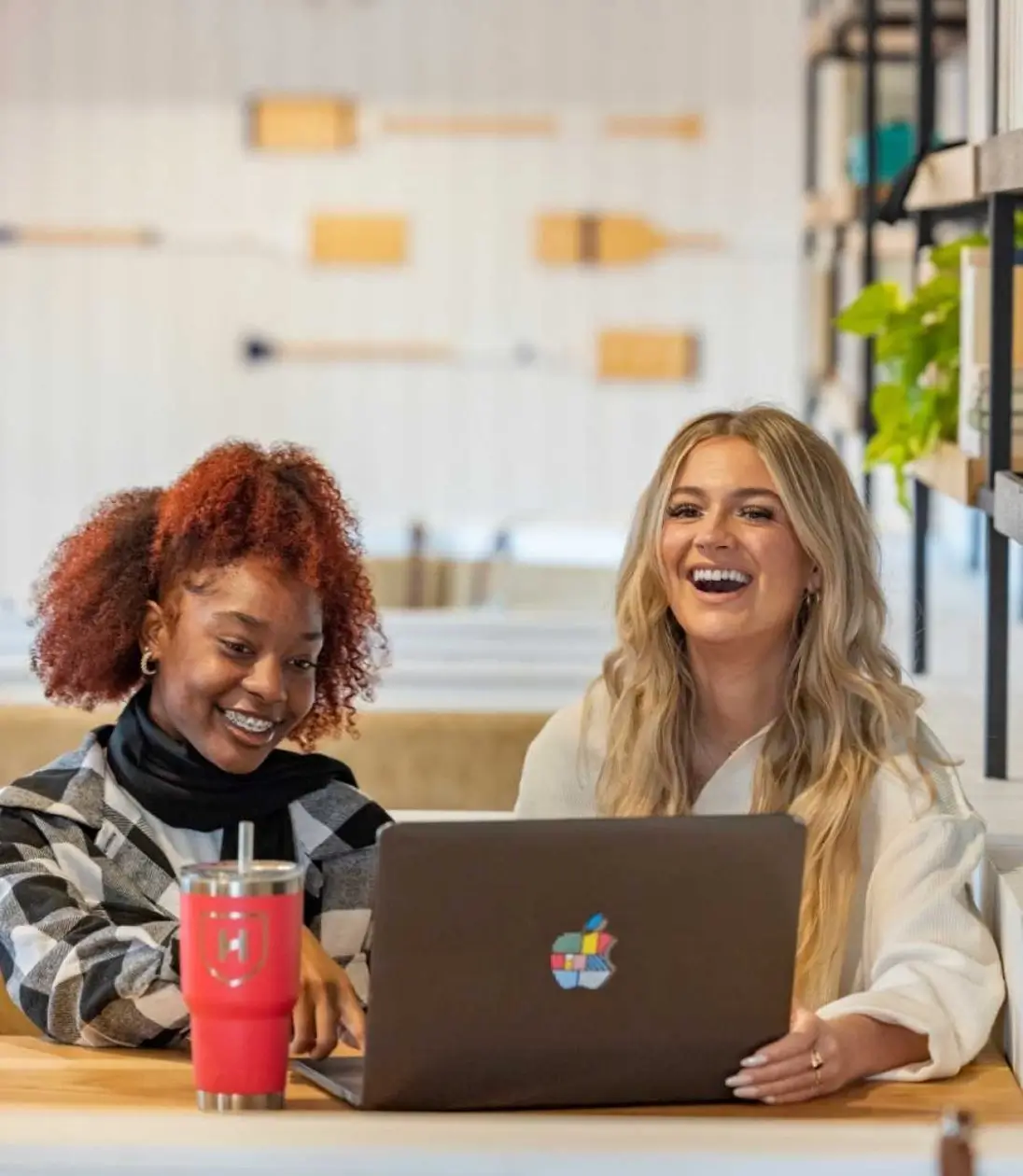 two young women studying